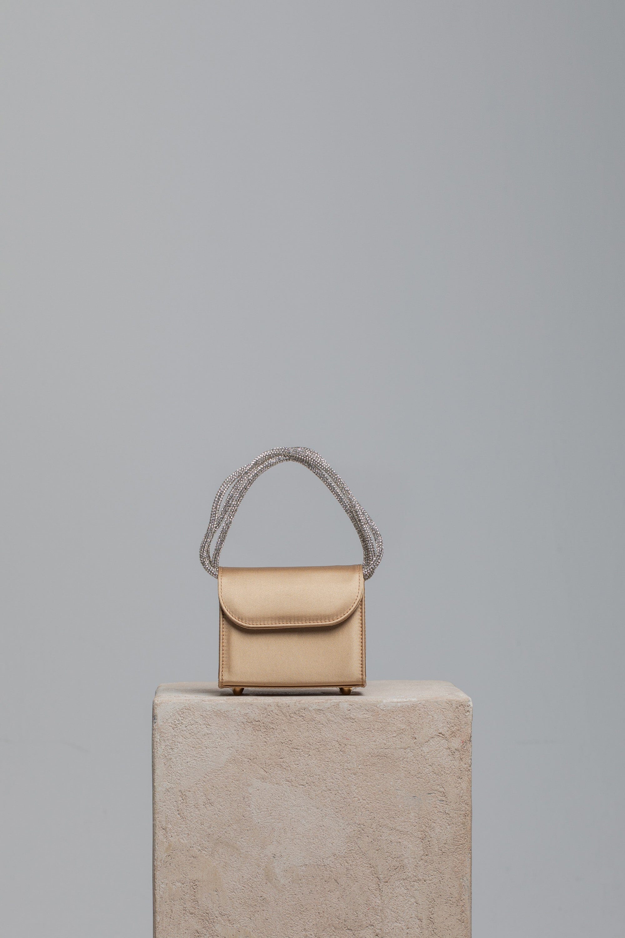Mini Loop Bag in Satin Handbags Folklore the label GOLD