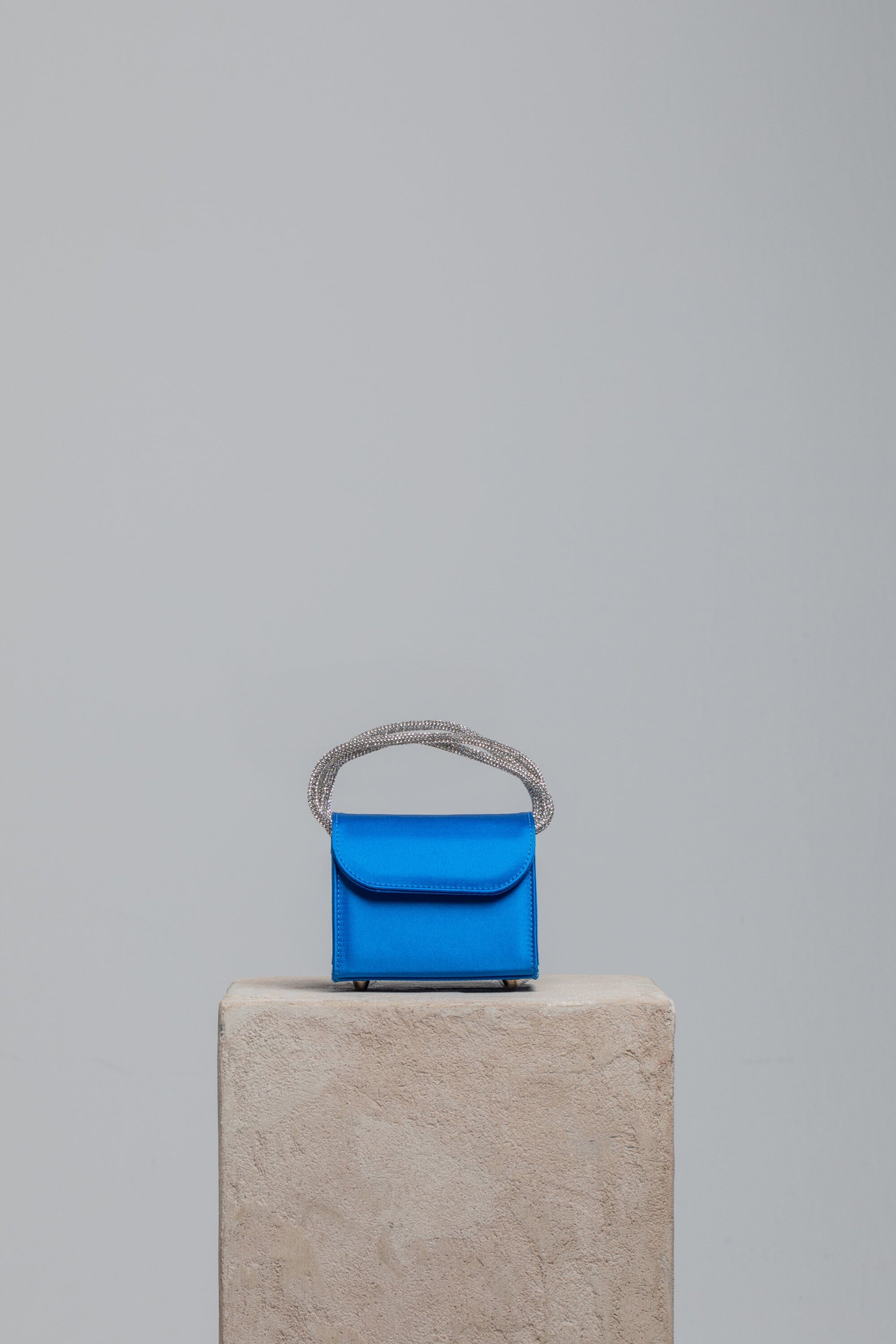 Mini Loop Bag in Satin Handbags Folklore the label ROYAL BLUE